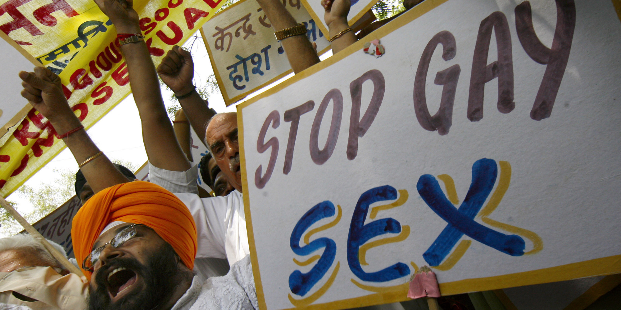 Activists of National Akali Dal shout slogans during protest in New Delhi