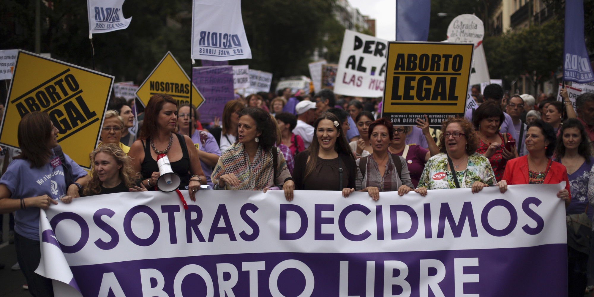 Demonstrators shout slogans during pro-choice protest against government's proposed new abortion law in Madrid